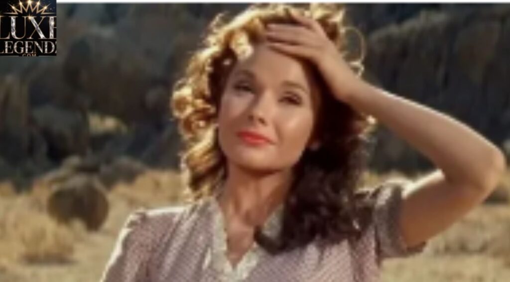 Felicia Farr as Emmy — Barmaid & Moral Compass